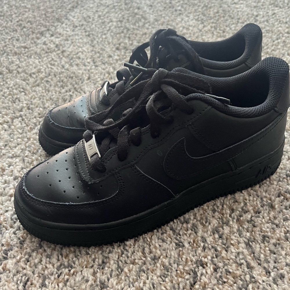 Nike All-Black Leather Sneakers